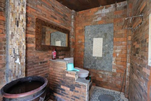 Koupelna v ubytování NewAlasKuliner & HomestayWatulumbung