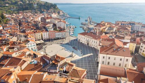 an aerial view of a city with a harbor at Apartment Lunaja in Piran