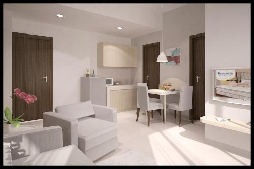 Area tempat duduk di Expressia Stay at Serpong Greenview Apartment