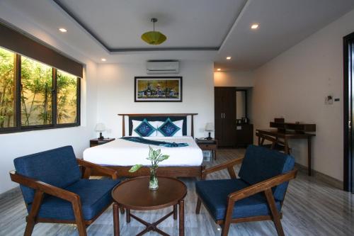 Posezení v ubytování Hoi An Four Seasons Villa