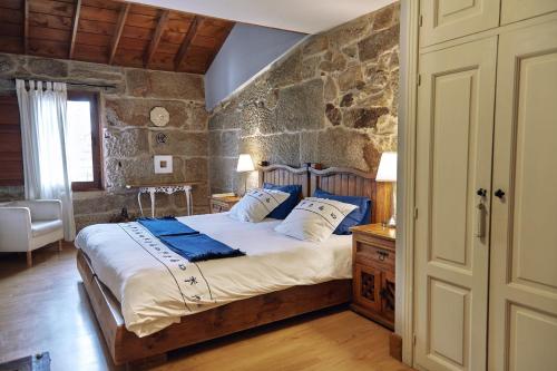 Säng eller sängar i ett rum på Casa Rural Sabariz