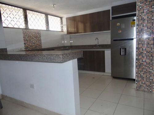 Η κουζίνα ή μικρή κουζίνα στο APARTAMENTO CON HERMOSA VlSTA AL MAR EN EL RODADERO