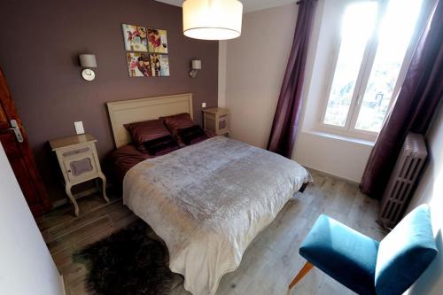 Katil atau katil-katil dalam bilik di Appartement Charlannes