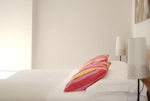 Ένα ή περισσότερα κρεβάτια σε δωμάτιο στο Hotel Elite