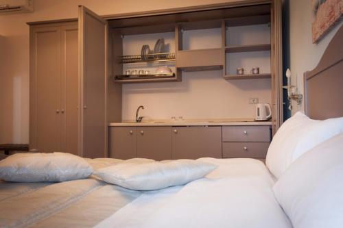 a bedroom with a bed with two pillows on it at Case Vacanze Al Duomo in Licata