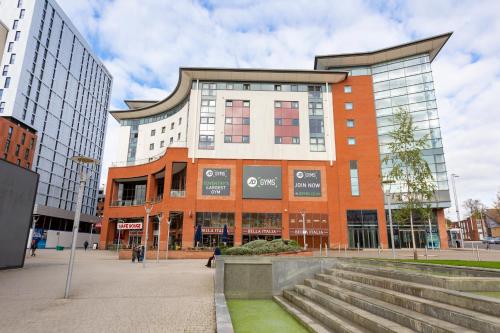 a building with a staircase in front of it at Belgrade Plaza Serviced Apartments in Coventry