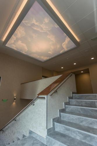a skylight in a stairwell with a ceiling at Hotel Olanesti & Spa Medical in Băile Olăneşti