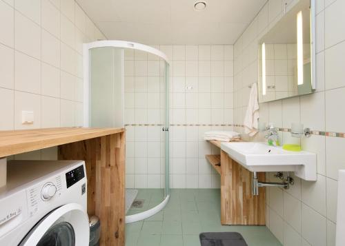 Ένα μπάνιο στο Foorum City Centre Apartment