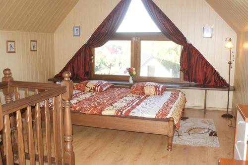 Katil atau katil-katil dalam bilik di Agrodomki Okej - Dom Oleńka