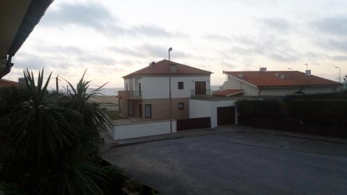 a view of a house from a roof at Labruge Ocean View in Labruge