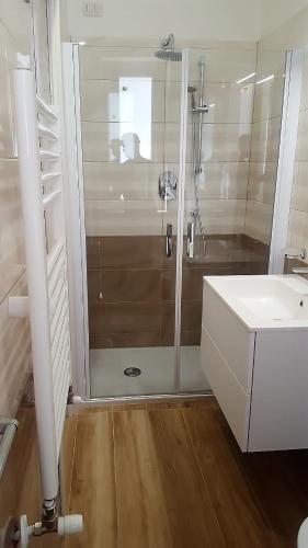 a bathroom with a shower and a sink at Appartamenti Borgo Panoramico N 5 in Tropea
