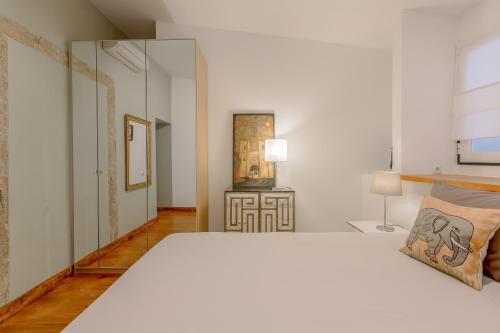 Ein Bett oder Betten in einem Zimmer der Unterkunft Lisbon Downtown Apartment Figueira