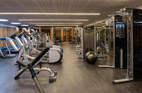 a gym with lots of exercise equipment and machines at Hotel Fasano Angra dos Reis in Angra dos Reis