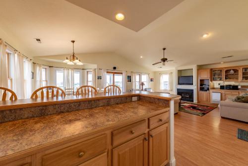 a large kitchen with a large island with wooden counter tops at Funtiki in Whalebone