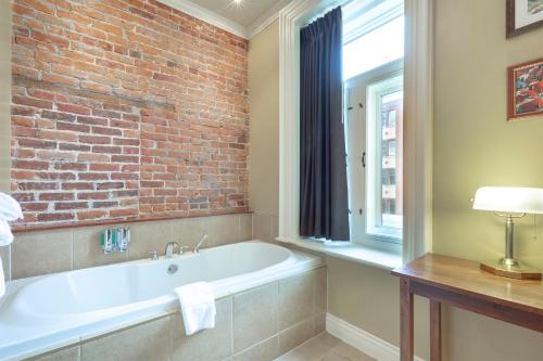Ванна кімната в Unilofts Grande-Allée