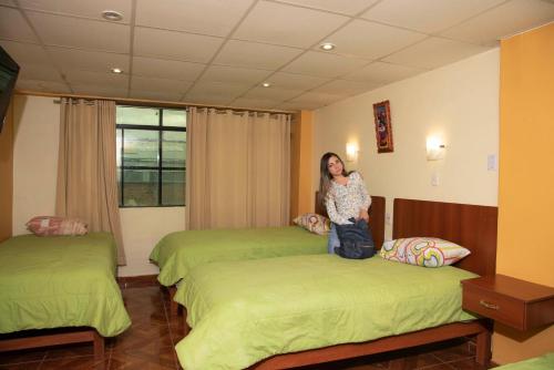 Ένα ή περισσότερα κρεβάτια σε δωμάτιο στο Hotel Las Lomas