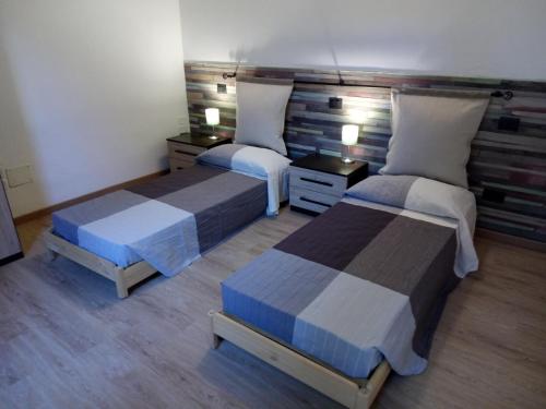 Giường trong phòng chung tại Giulia in S.Reparata