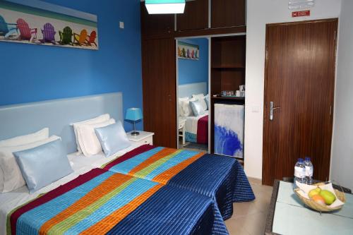 Giường trong phòng chung tại Casa Da Praia "AL"
