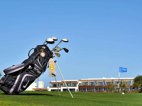a giant shoe on a golf course in the grass at Le Médina Essaouira Thalassa Sea & Spa - MGallery Collection in Essaouira