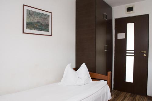 Кровать или кровати в номере Hostel Bella Italia