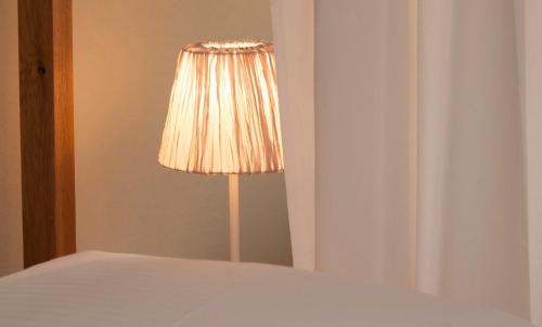 Ένα ή περισσότερα κρεβάτια σε δωμάτιο στο Bed and Breakfast unter den Linden