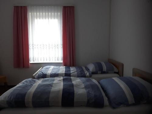 
Ein Bett oder Betten in einem Zimmer der Unterkunft Gasthof Zabeltitz
