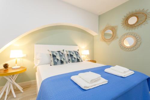 Кровать или кровати в номере Nueva ALMUDENA Apartment by Cadiz4Rentals