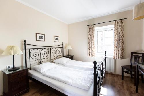 Säng eller sängar i ett rum på Landhaus Piber