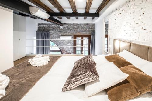 Un ou plusieurs lits dans un hébergement de l'établissement Industrial Loft Venice R&R