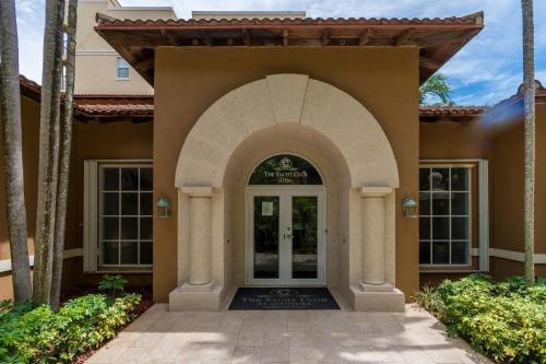 a entry to a home with an archway at Yacht Club at Aventura Luxurious 1 Bed 1 Bath in Aventura