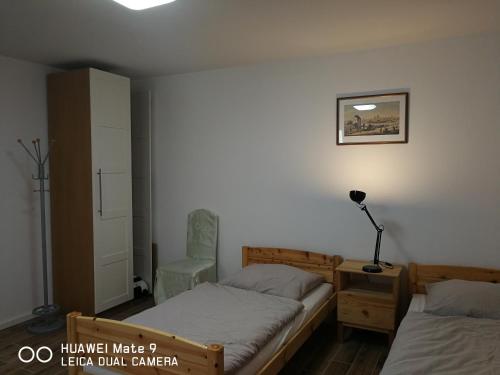Ένα ή περισσότερα κρεβάτια σε δωμάτιο στο 21a Comfortable Studio