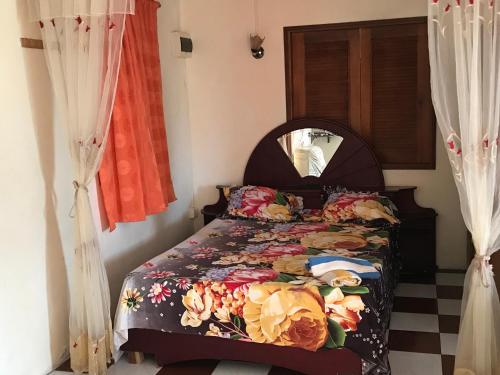 Cama o camas de una habitación en Sun Tropical Paradise