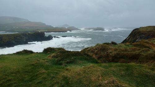 a view of the ocean from a grassy hill at Reenglas House in Valentia Island