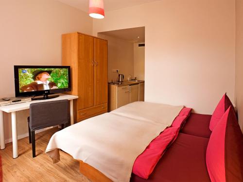 Cama ou camas em um quarto em Hotel PurPur
