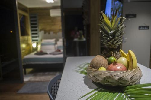 Postel nebo postele na pokoji v ubytování BUNGA-LODGE (bungalow 4* avec piscine privée)