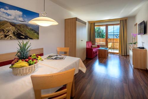 TV a/nebo společenská místnost v ubytování Apart-Hotel Aurora Fiss