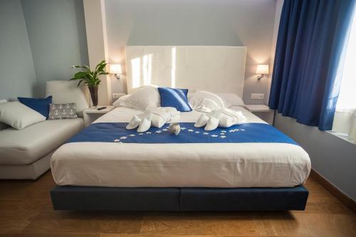 Katil atau katil-katil dalam bilik di Hotel Boutique Barra Alta (Adults Only)