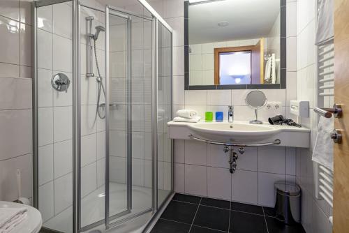 Koupelna v ubytování Apart-Hotel Aurora Fiss