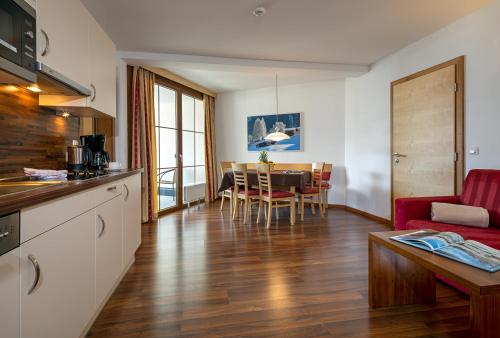 Kuchyň nebo kuchyňský kout v ubytování Apart-Hotel Aurora Fiss