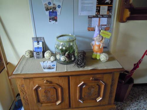 a small table with a fish bowl on top of it at Ferienhaus Höchhäusl in Werfenweng