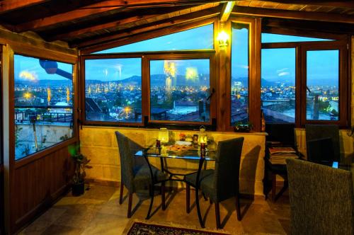 a dining room with a view of a city at Sendian-guesthouse in Avanos