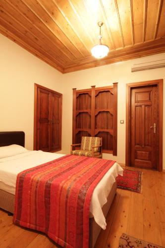 Katil atau katil-katil dalam bilik di Konya Dervish Hotel