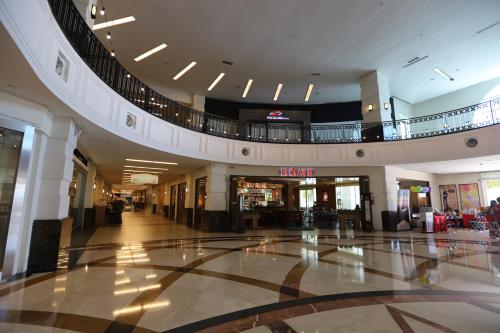 a large shopping mall with a shopping center at The Straits Quay Marina by Messina Clive in George Town