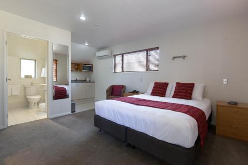 Cama o camas de una habitación en Riccarton Motor Lodge