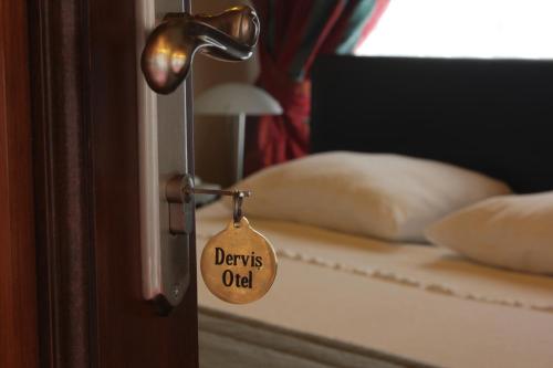Katil atau katil-katil dalam bilik di Konya Dervish Hotel