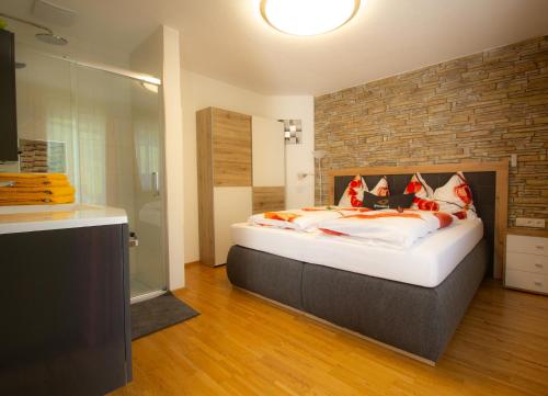 Postel nebo postele na pokoji v ubytování Appartement Sonnblick Kuschelsuite in den Bergen