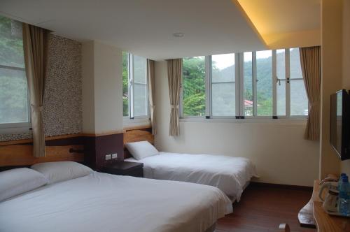Chihpen Lucky Hot Spring B&Bにあるベッド