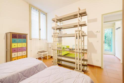 Posteľ alebo postele v izbe v ubytovaní Torre dell'Orologio Apartment