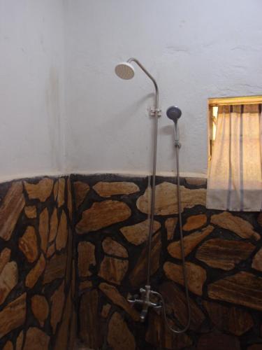 Vannas istaba naktsmītnē Salem Uganda Guesthouse