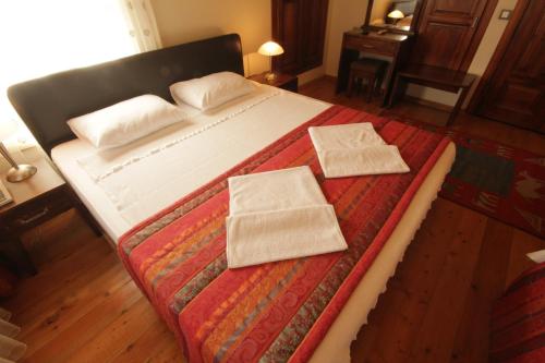 Katil atau katil-katil dalam bilik di Konya Dervish Hotel